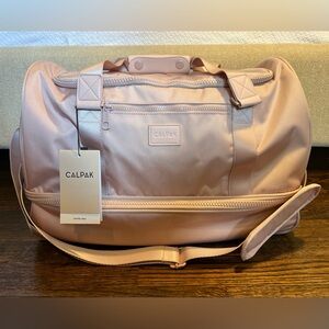 Calpak Stevyn Duffel in Pink Sand